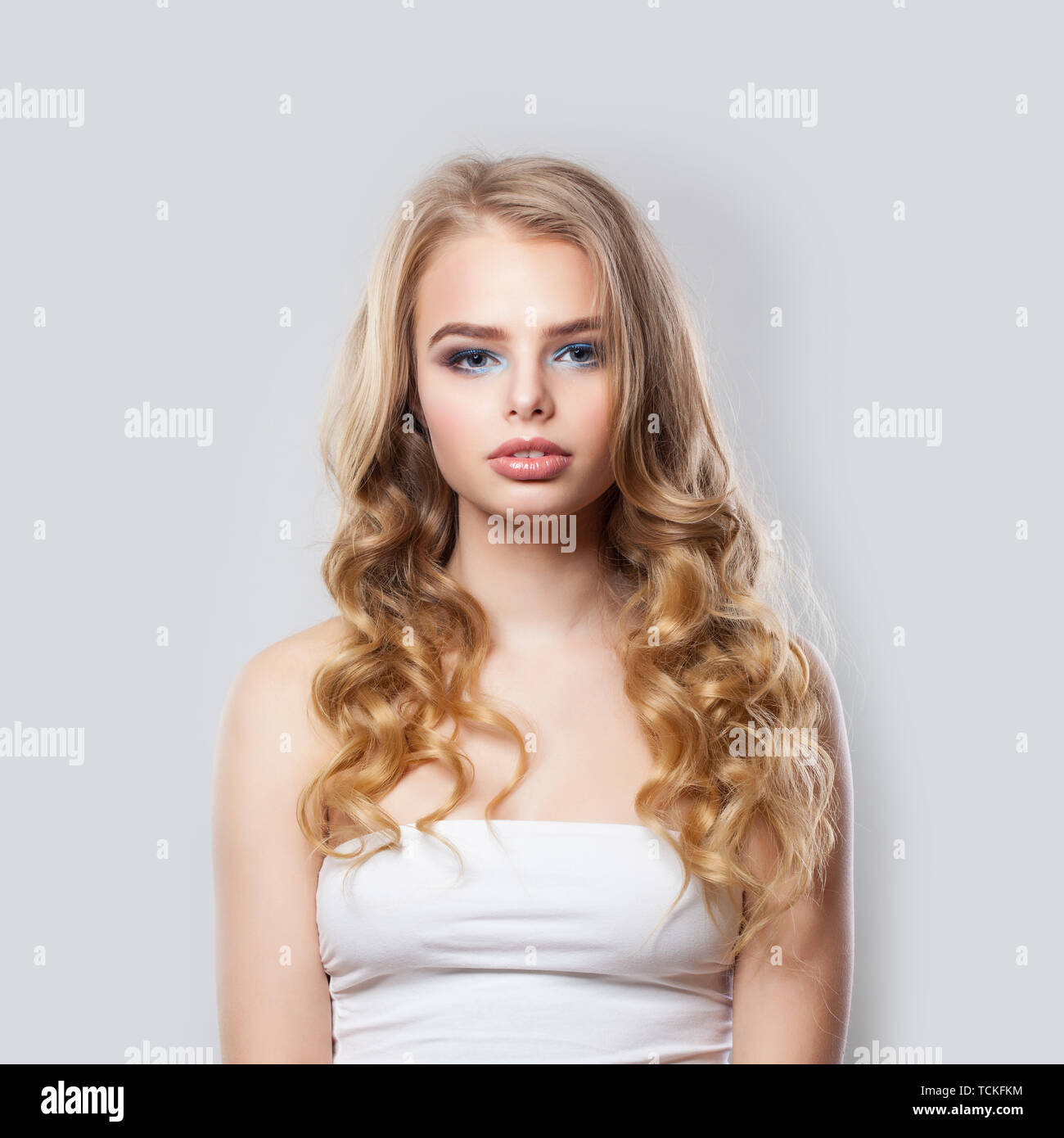 Pretty girl looking at camera, portrait Stock Photo