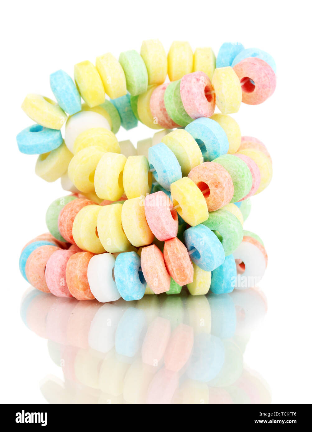 Color candies on rope isolated on white Stock Photo - Alamy