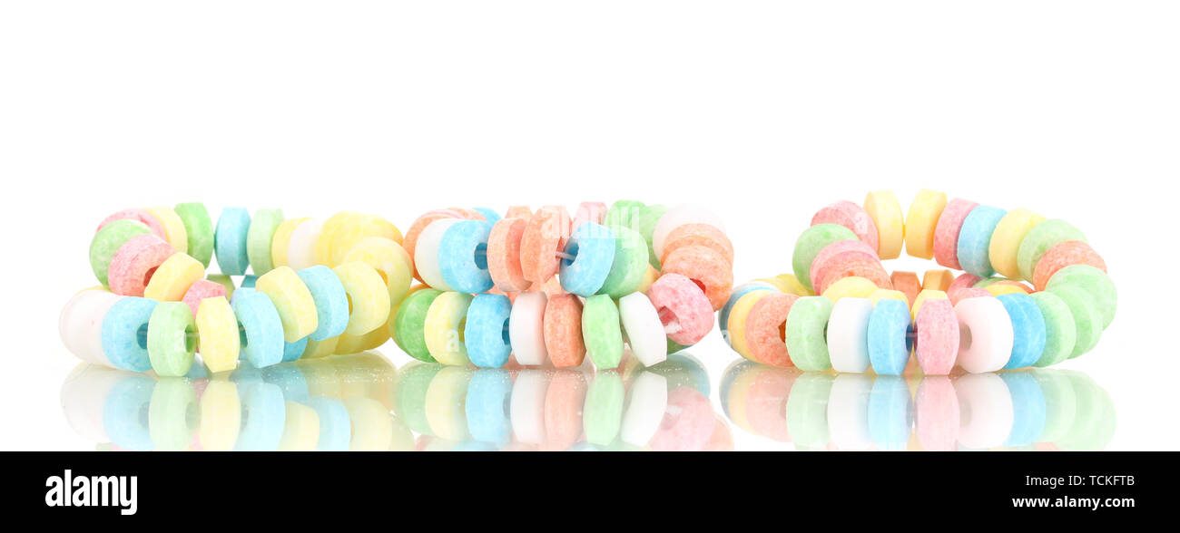 Color candies on rope isolated on white Stock Photo - Alamy