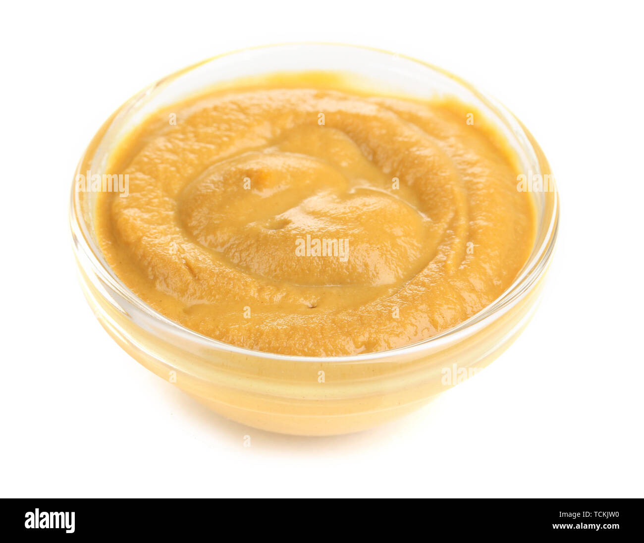 Mustard in glass bowl isolated on white Stock Photo Alamy