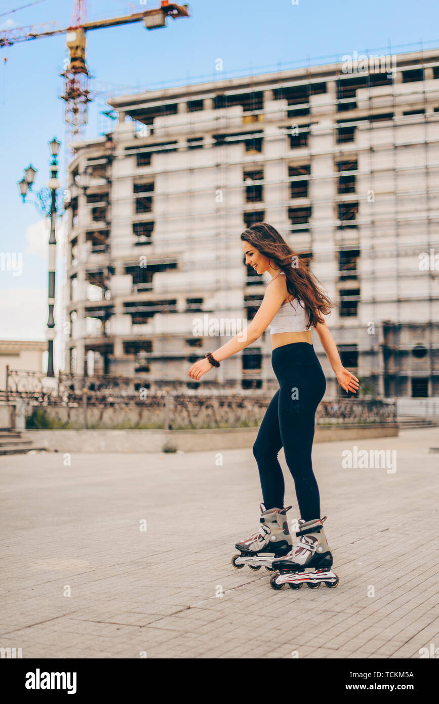 Urban girl rollerblading in street city. active lifestyle Stock Photo -  Alamy