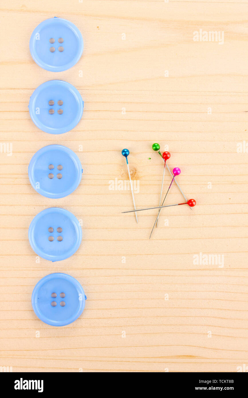 Colorful sewing buttons on wooden background Stock Photo - Alamy