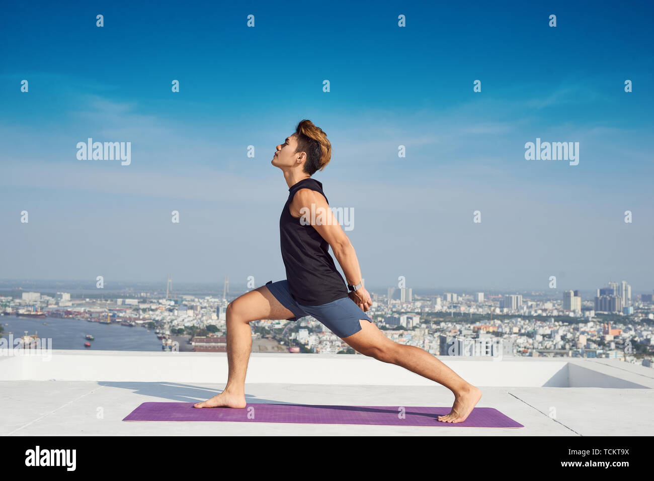Advanced Yoga Practitioner Woman in Extreme Yoga Pose Stock Photo