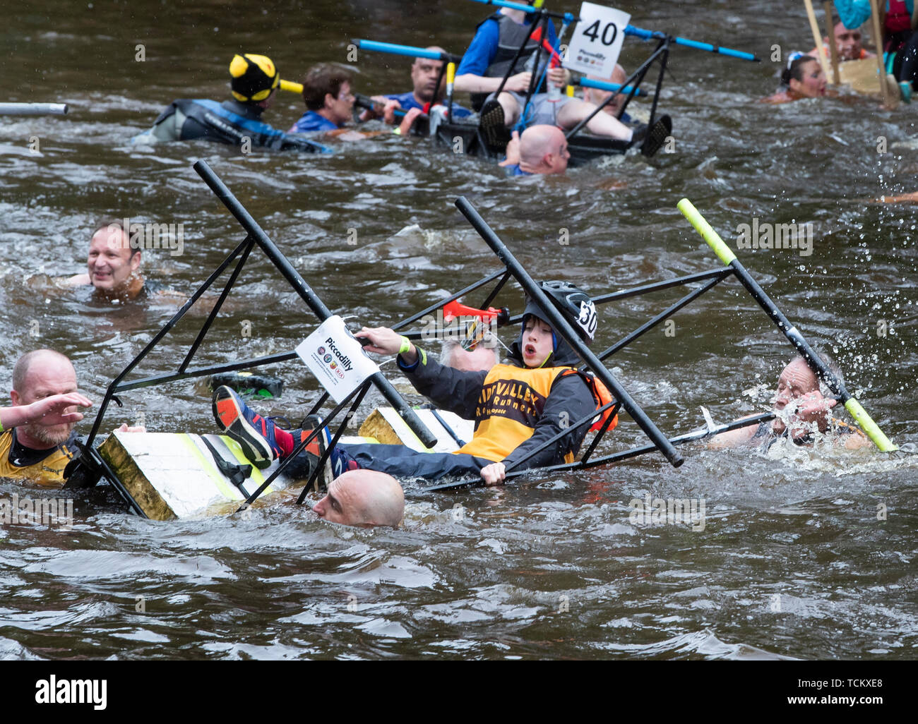 Competitors cross the River Nidd as they take part in the Great