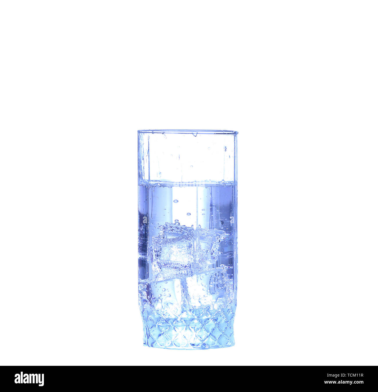 Glass of water, ice and slice of fresh lemon on a white background ...