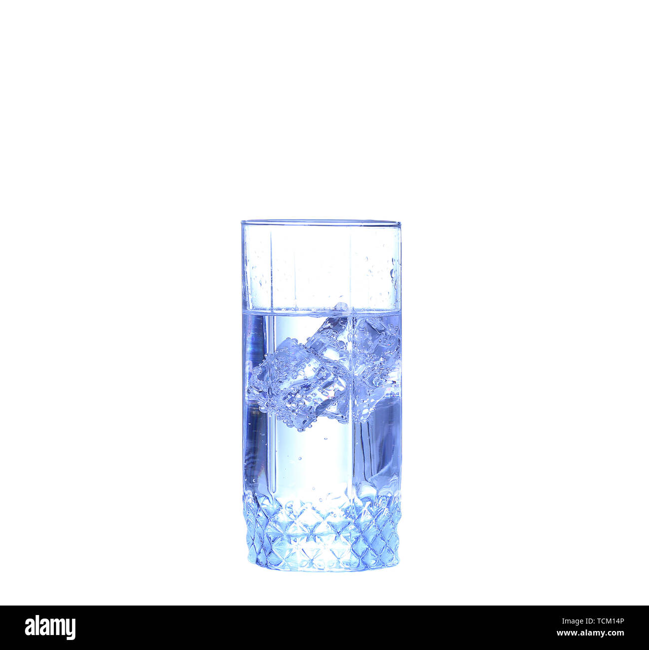 Glass of water, ice and slice of fresh lemon on a white background ...