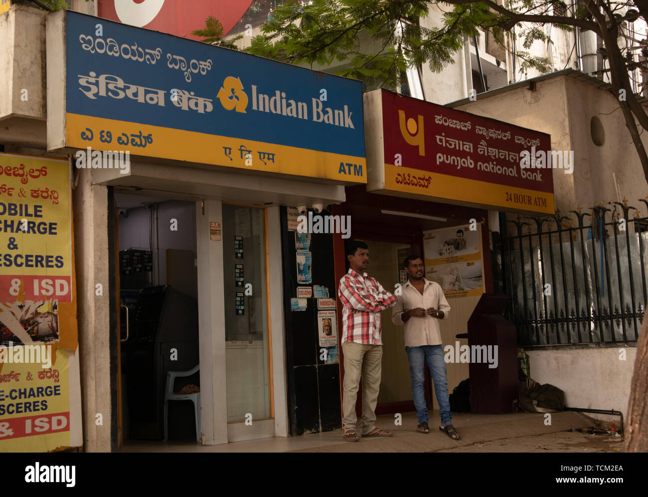 BANGALORE INDIA June 3, 2019 :People talking infront of the Indian bank ATM and Punjab national bank ATM at bangalore railway station. Stock Photo