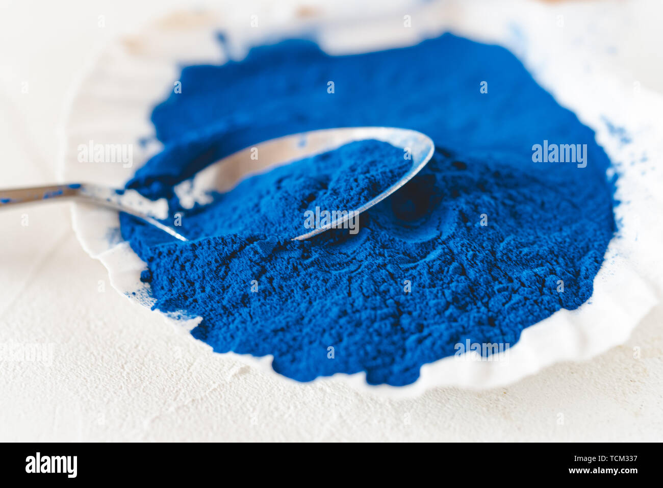 Blue Spirulina algae powder, healthy dietary supplement. Stock Photo