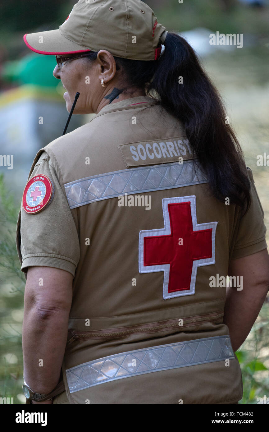 Portuguese Red Cross (Cruz Vermelha Portuguesa) woman providing medical support  at a local event in Portugal. Stock Photo