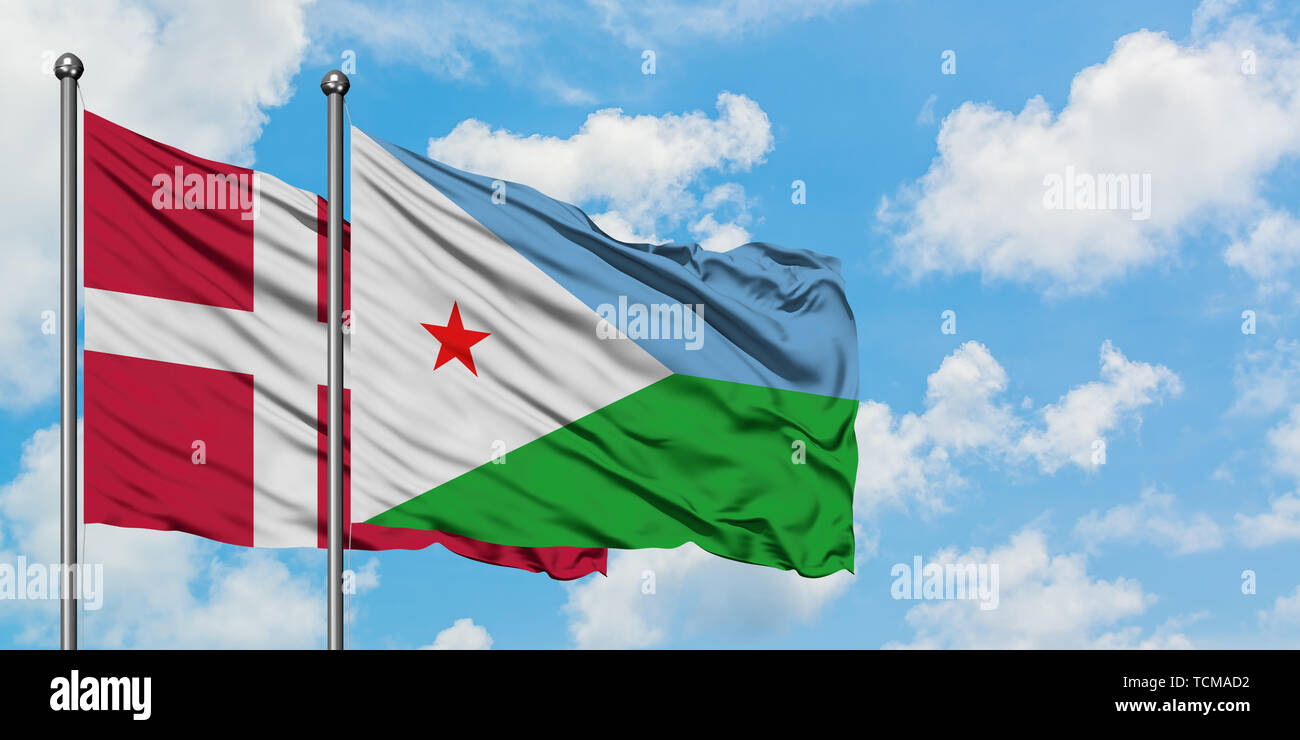 Denmark and Djibouti flag waving in the wind against white cloudy blue sky together. Diplomacy concept, international relations. Stock Photo