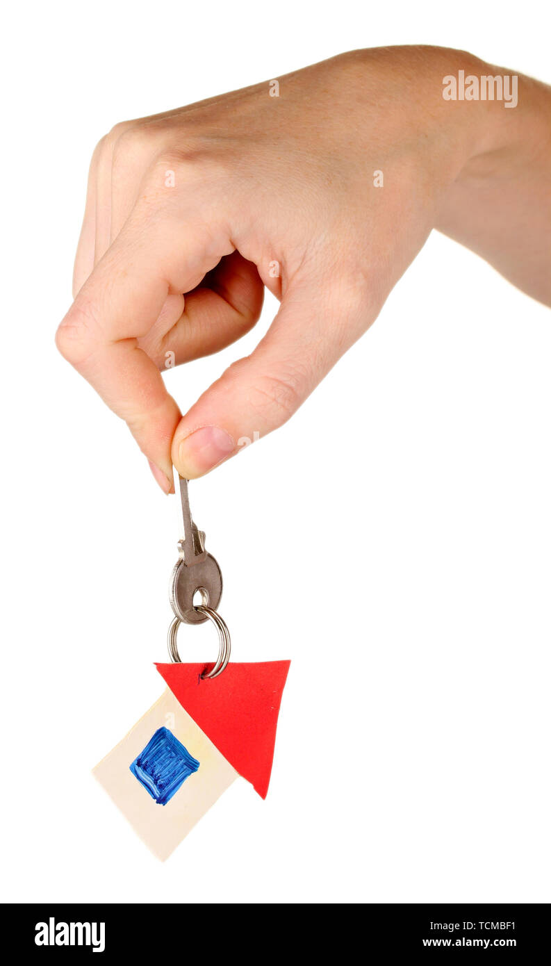 hand holds key isolated on white Stock Photo - Alamy