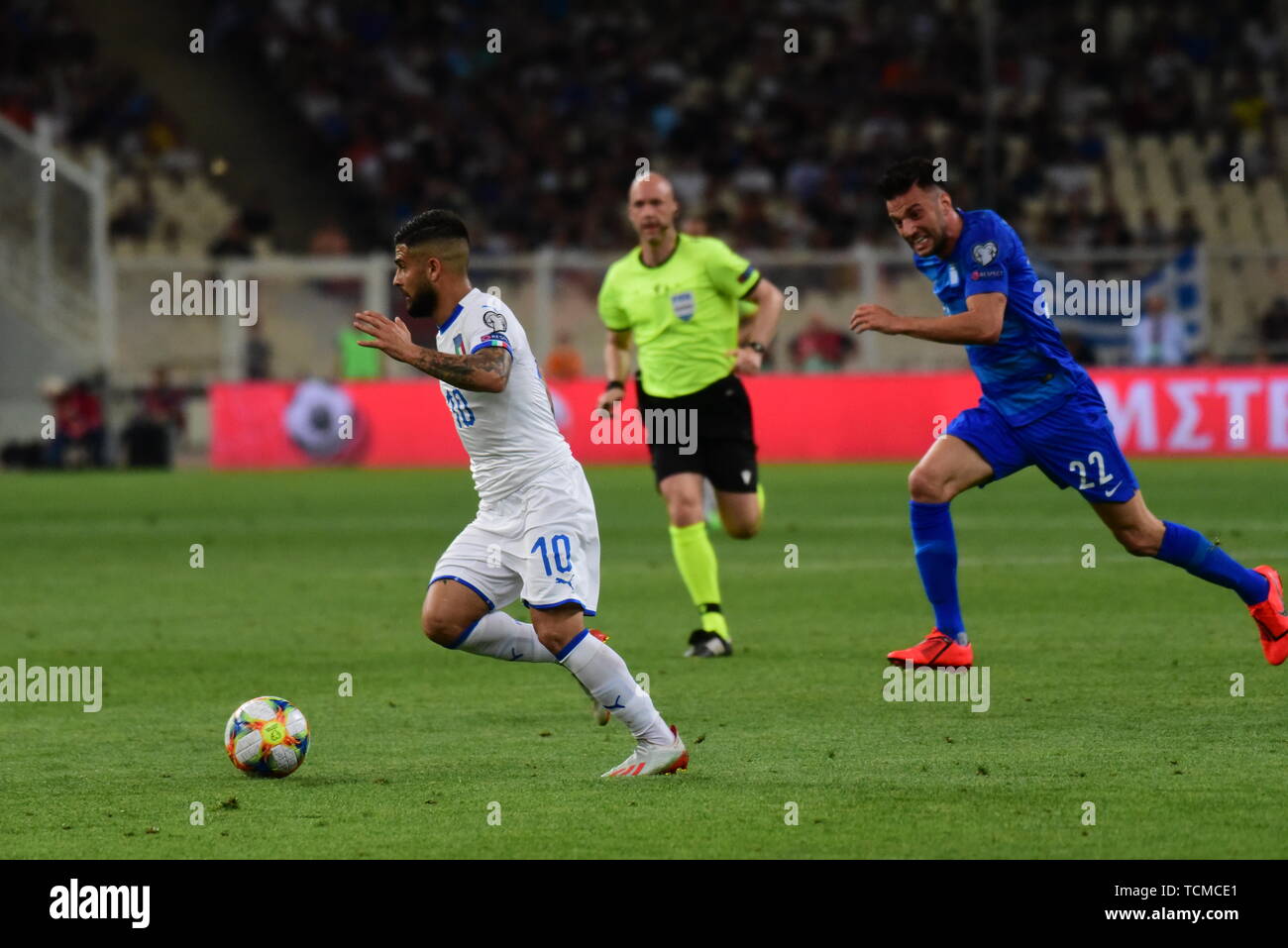 Athens, Greece. 08th June, 2019. Lorenzo Insigne (no 10) of Italy and Andreas Samaris (no 22) of Greece, vies for the ball. Credit: Dimitrios Karvountzis/Pacific Press/Alamy Live News Stock Photo