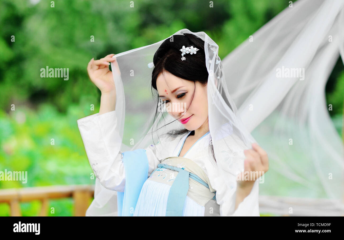 A beautiful Asian woman in the open air,portraits Stock Photo