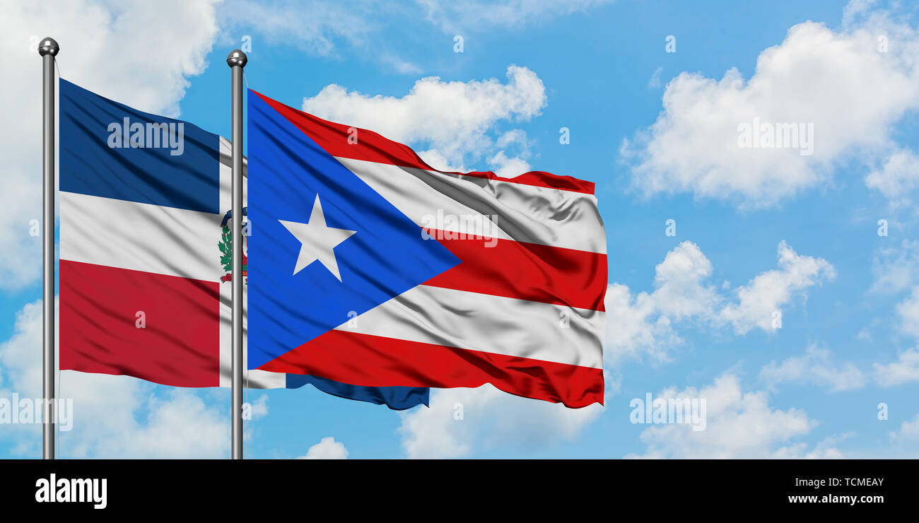 Dominican Republic And Puerto Rico Flag Waving In The Wind Against White Cloudy Blue Sky Together Diplomacy Concept International Relations Stock Photo Alamy