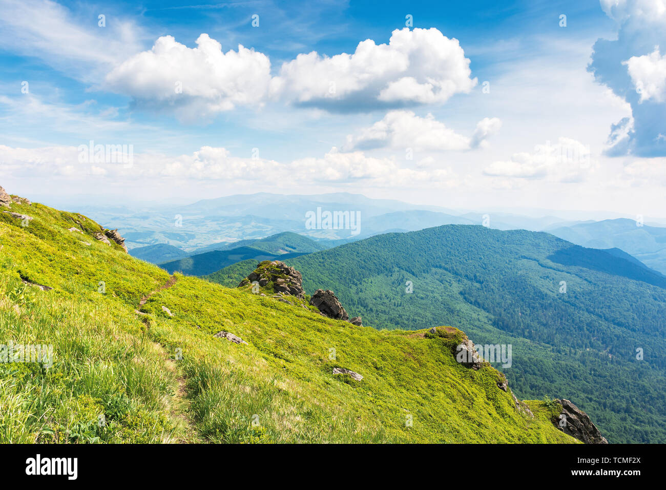 Amazing View From The Top Of A Mountain Path Through The Meadow With Huge Boulders On The Edge Summer Landscape With Hills Of The Ridge Rolling Down Stock Photo Alamy Amazing View From The Top Of A Mountain Path Through The Meadow With Huge Boulders On The Edge Summer Landscape With Hills Of The Ridge Rolling Down Stock Photo Alamy