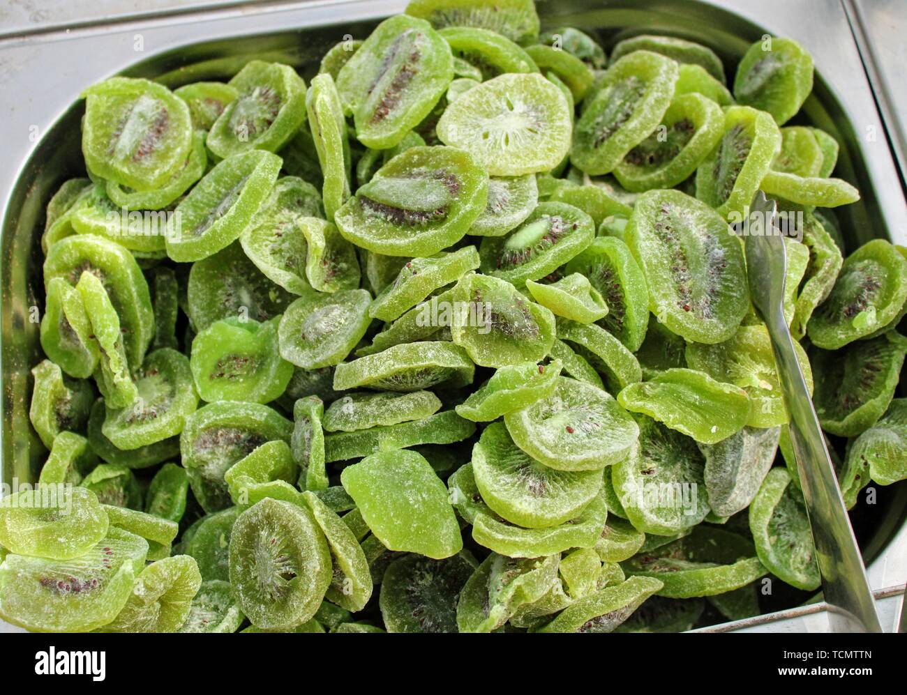 Rich and healthy slices of dried kiwi in the market Stock Photo