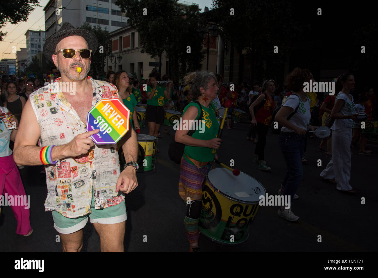 Athens, Greece. 8th June 2019. People march dancing, waving rainbow flags and holding placards during the Athens Pride 2019 parade. Thousands joined the Athens Pride annual event which was this year dedicated to Zak Kostopoulos, the LGBTQ activist who was beaten to death in broad daylight back in September 2018. Credit: Nikolas Georgiou/Alamy Live News Stock Photo