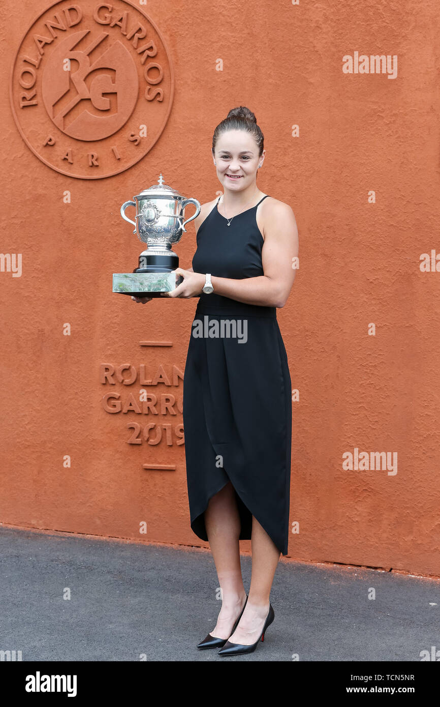 Paris, France. 9th June 2019. Ashleigh Barty of Australia poses with the  trophy during a photo shoot after winning the Women's singles final match  of the French Open tennis tournament at the