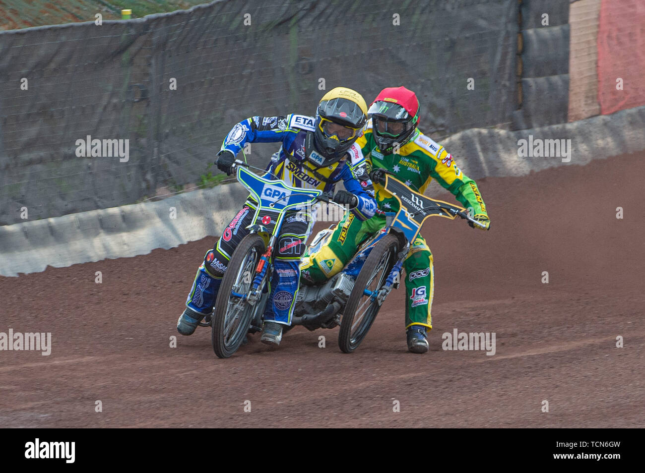 Glasgow, Scotland, UK. 08th June, 2019.  Pontus Aspgren (Yellow) tangles with Chris Holder (Red) during the FIM Speedway Grand Prix World Championship - Qualifying Round 1 at the Peugeot Ashfield Stadium, Glasgow on Saturday 8th June 2019. (Credit: Ian Charles | MI News) Credit: MI News & Sport /Alamy Live News Stock Photo