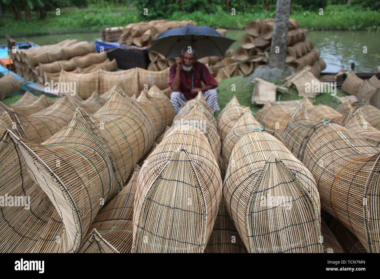 Pirojpur Barisal Bangladesh 6th June 19 A Trader Sells Fish Traps At Atghar Bazar In Pirojpur Local Variety Of Fishes Are Being Caught Using Different Traps And At The Market Each Pair Is Pirojpur Barisal Bangladesh 6th June 19 A Trader Sells Fish Traps At Atghar Bazar In Pirojpur Local Variety Of Fishes Are Being Caught Using Different Traps And At The Market Each Pair Is