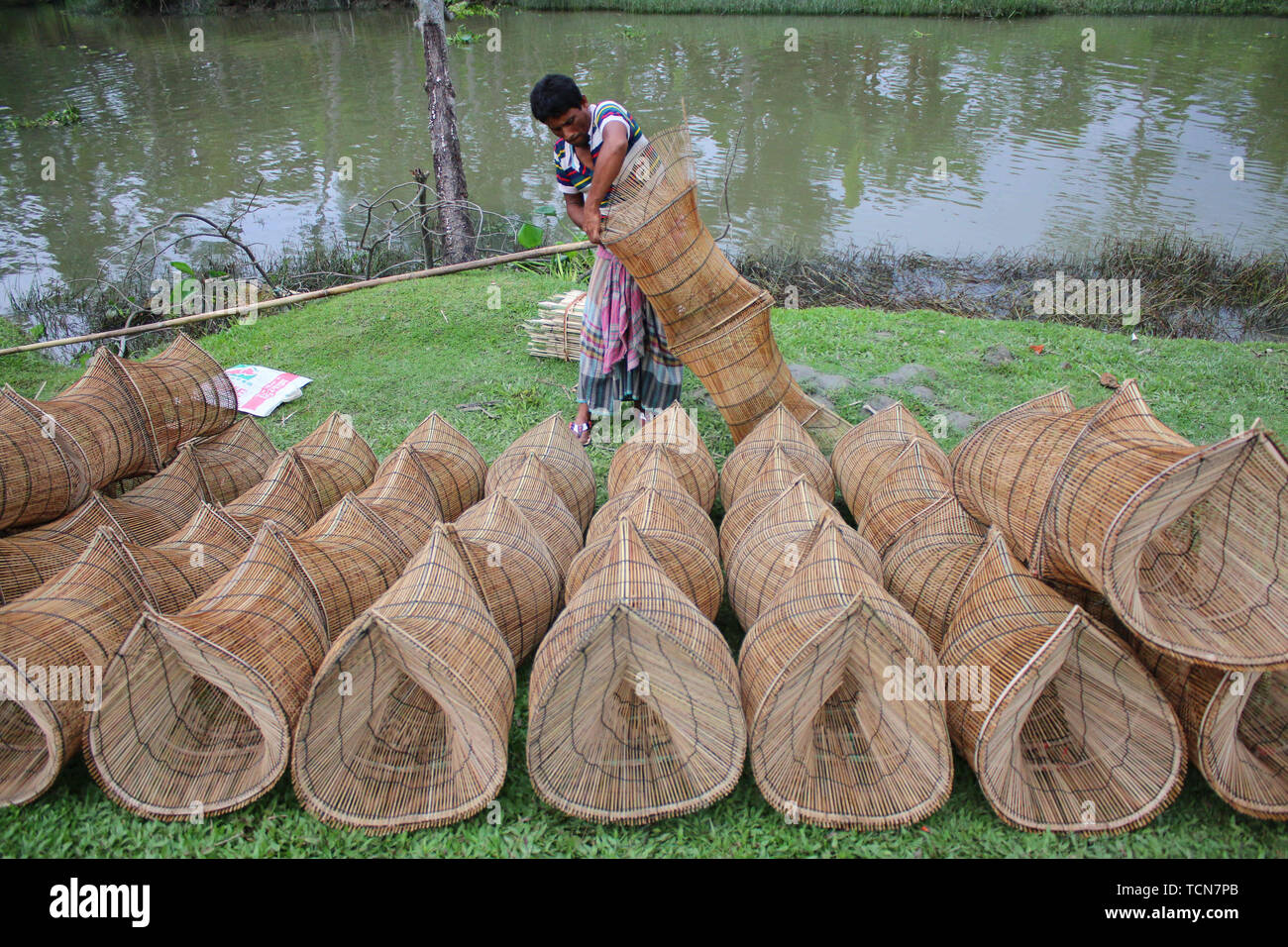 Pirojpur Barisal Bangladesh 6th June 19 A Trader Sells Fish Traps At Atghar Bazar In Pirojpur Local Variety Of Fishes Are Being Caught Using Different Traps And At The Market Each Pair Is Pirojpur Barisal Bangladesh 6th June 19 A Trader Sells Fish Traps At Atghar Bazar In Pirojpur Local Variety Of Fishes Are Being Caught Using Different Traps And At The Market Each Pair Is