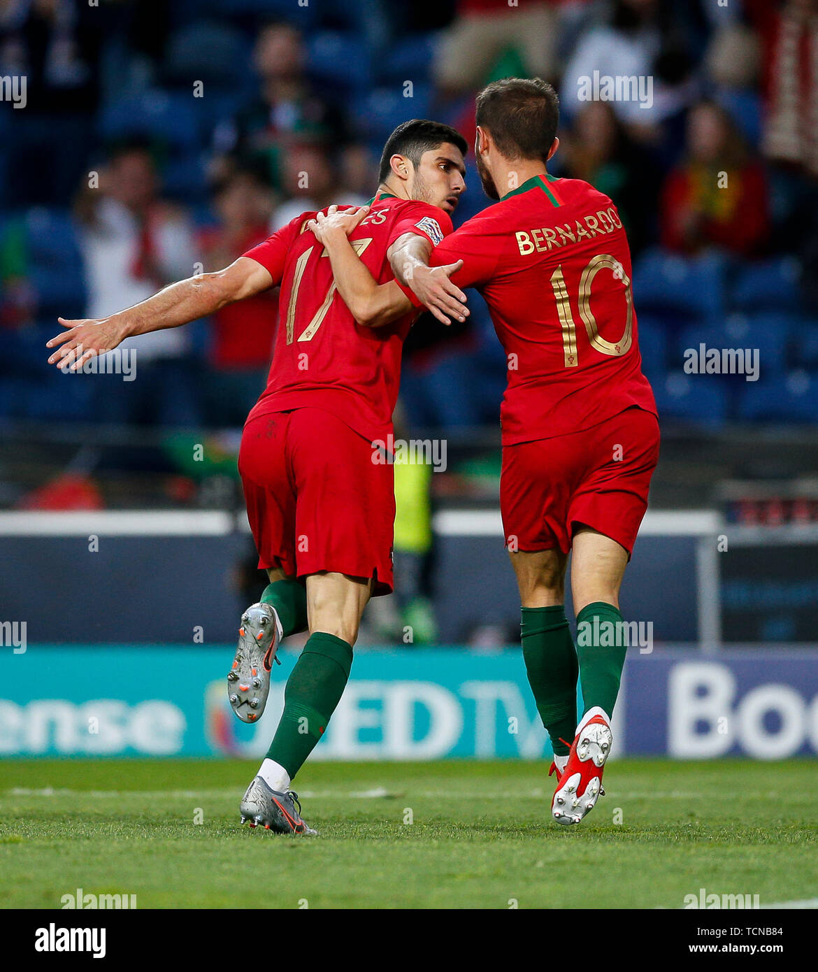 Porto, Portugal. 09th June, 2019. Goncalo Guedes of Portugal celebrates with Bernardo Silva of Portugal after scoring his side's first goal to make the score 1-0 during the UEFA Nations League Final match between Portugal and Netherlands at Estadio do Dragao on June 9th 2019 in Porto, Portugal. (Photo by Daniel Chesterton/phcimages.com) Credit: PHC Images/Alamy Live News Stock Photo