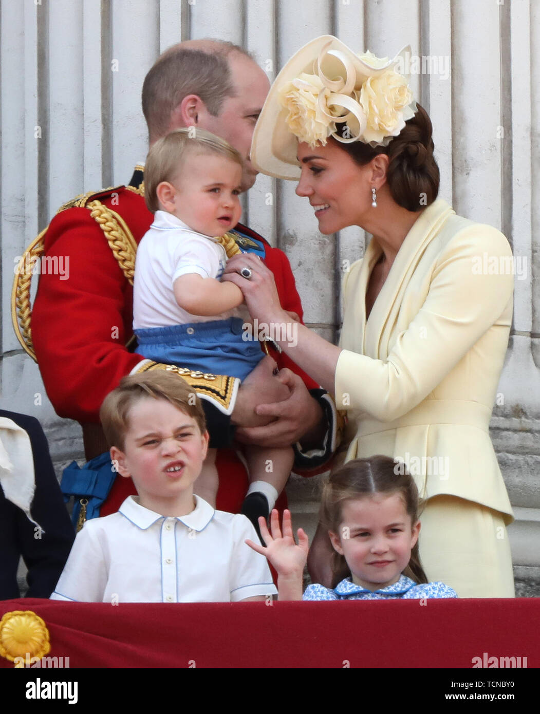 Prince William (Duke of Cambridge) holding Prince Louis, Kate Middleton (Duchess of Cambridge ...
