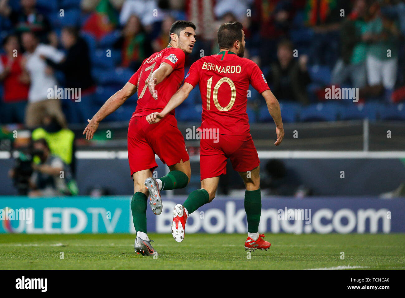 Porto, Portugal. 09th June, 2019. Goncalo Guedes of Portugal celebrates with Bernardo Silva of Portugal after scoring his side's first goal to make the score 1-0 during the UEFA Nations League Final match between Portugal and Netherlands at Estadio do Dragao on June 9th 2019 in Porto, Portugal. (Photo by Daniel Chesterton/phcimages.com) Credit: PHC Images/Alamy Live News Stock Photo