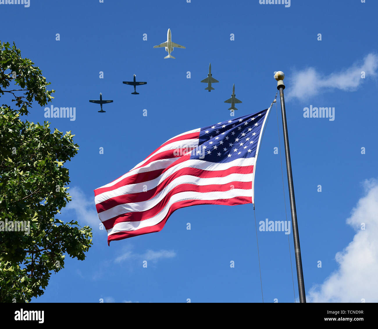 A five-ship formation performs a flyover during a Memorial Day ceremony practice run May 21, 2019, at the Richard “Gene” Smith Plaza on Columbus Air Force Base, Miss. The lead aircraft, a T-1A Jayhawk, was the same aircraft that 1st Lt. David Albandoz, Specialized Undergraduate Pilot Training Class 17-14 graduate, flew during his last flight as a student pilot in SUPT here. (U.S. Air Force photo by Melissa Doublin) Stock Photo