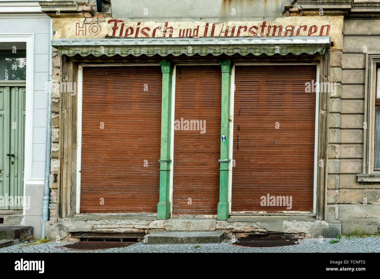 historical gdr (east germany) butcher shop for meat and sausages closed for 30 years now Stock Photo