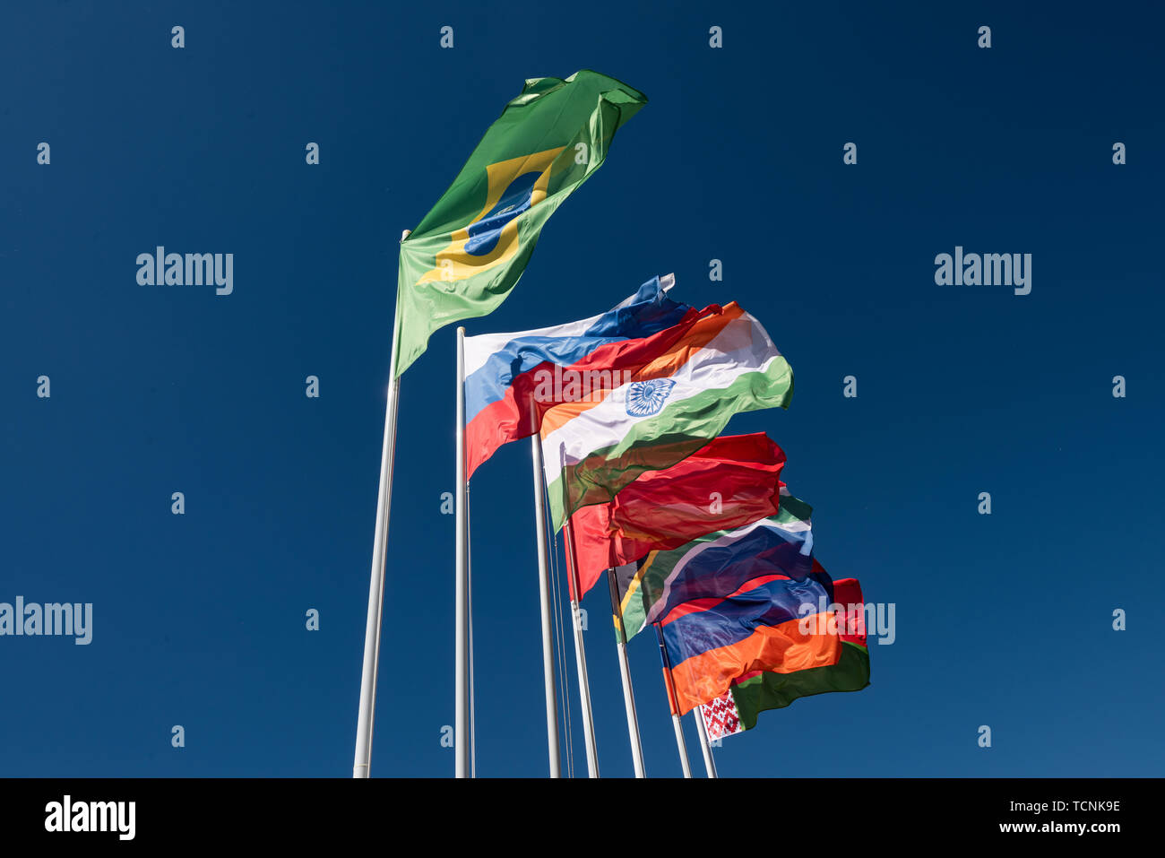 Flags of the BRICS countries in the blue sky Stock Photo