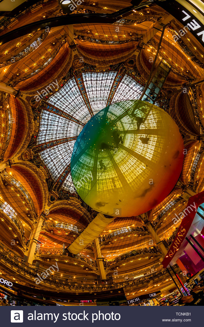 A trampoline suspended below the stained glass dome of Galeries Lafayette  Paris Haussmann department store, Paris, France Stock Photo - Alamy