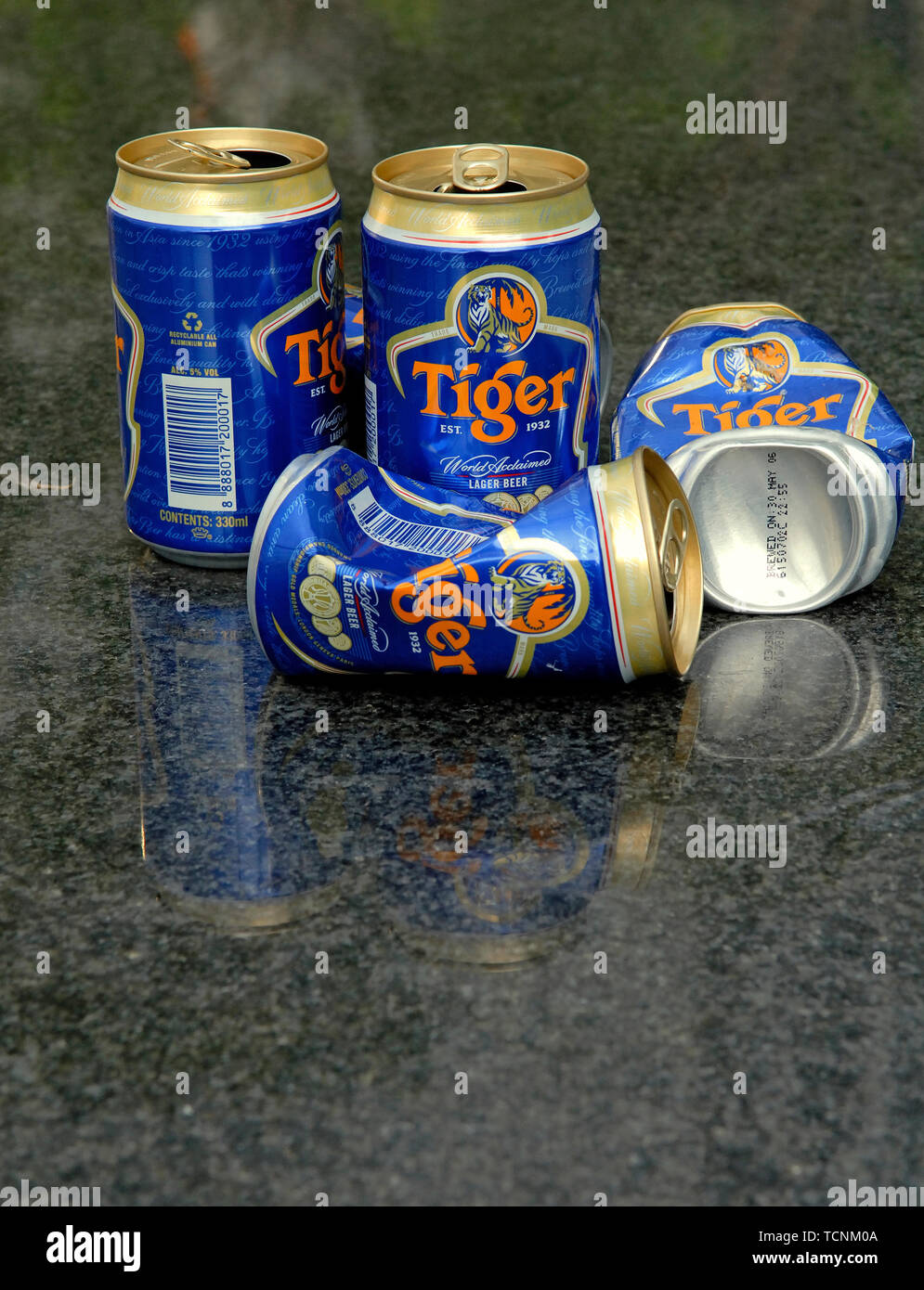 singapore, singapore - september 09, 2009: empty tiger beer cans at uob plaza Stock Photo