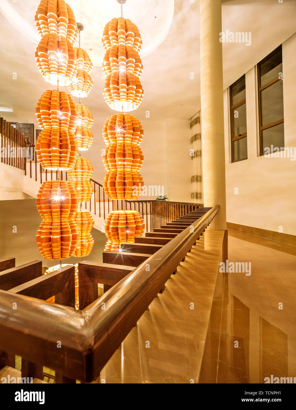 Hotel lobby glass stairs hi-res stock photography and images - Alamy