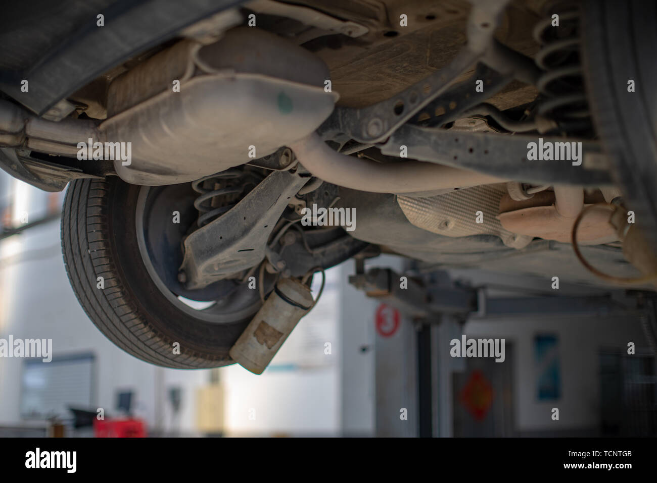 Motor vehicle hoisting replace brake oil repair hires stock