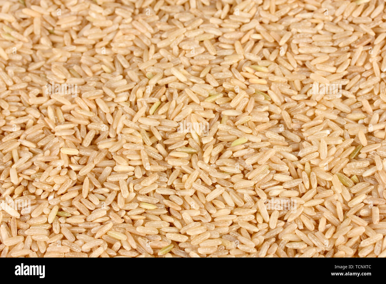 Background brown rice Stock Photo - Alamy