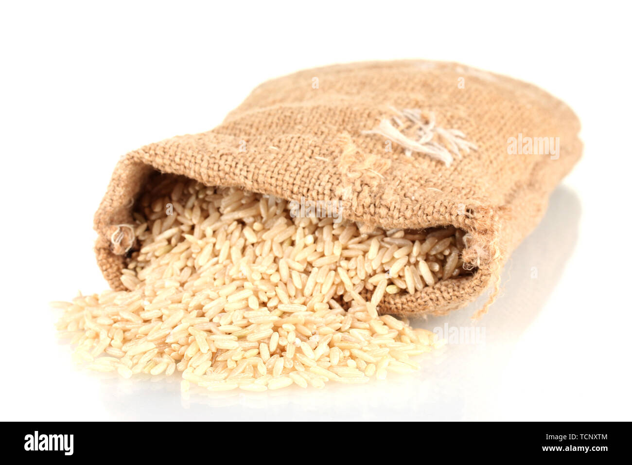 Cloth bag of rice isolated on white Stock Photo - Alamy