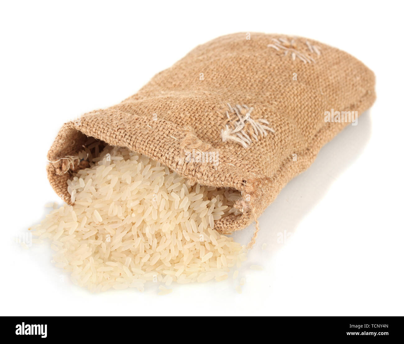Cloth bag of rice isolated on white Stock Photo - Alamy