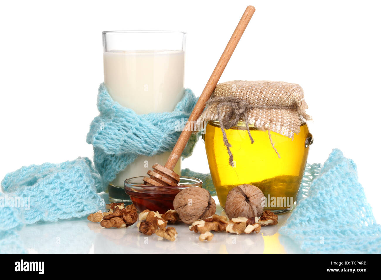 Healthy ingredients for strengthening immunity on warm scarf isolated on white Stock Photo