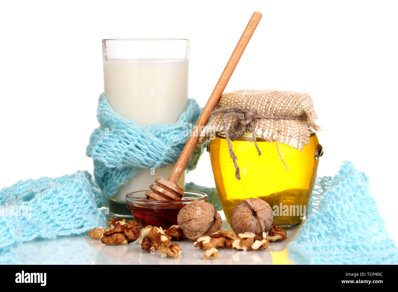 Healthy ingredients for strengthening immunity on warm scarf isolated on white Stock Photo