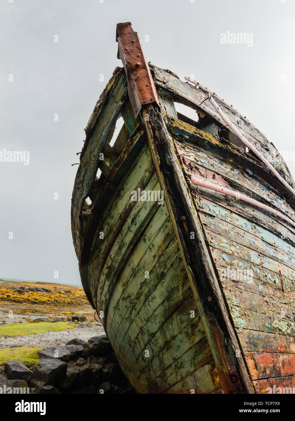Two abandoned fishing boats along the shore of Salen Bay on the Island of Mull, Scotland Stock Photo