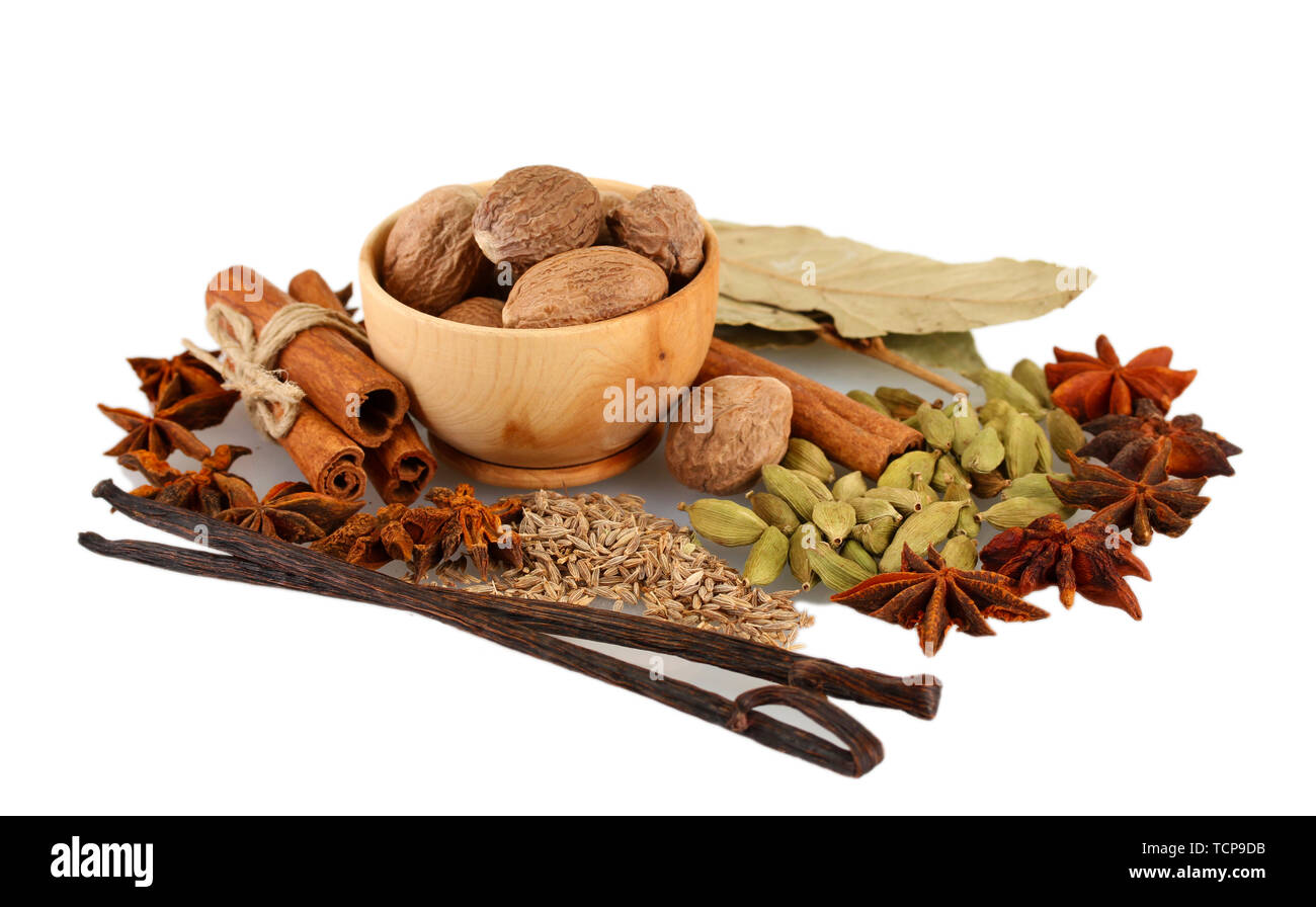 Nutmeg and other spices isolated on white Stock Photo Alamy