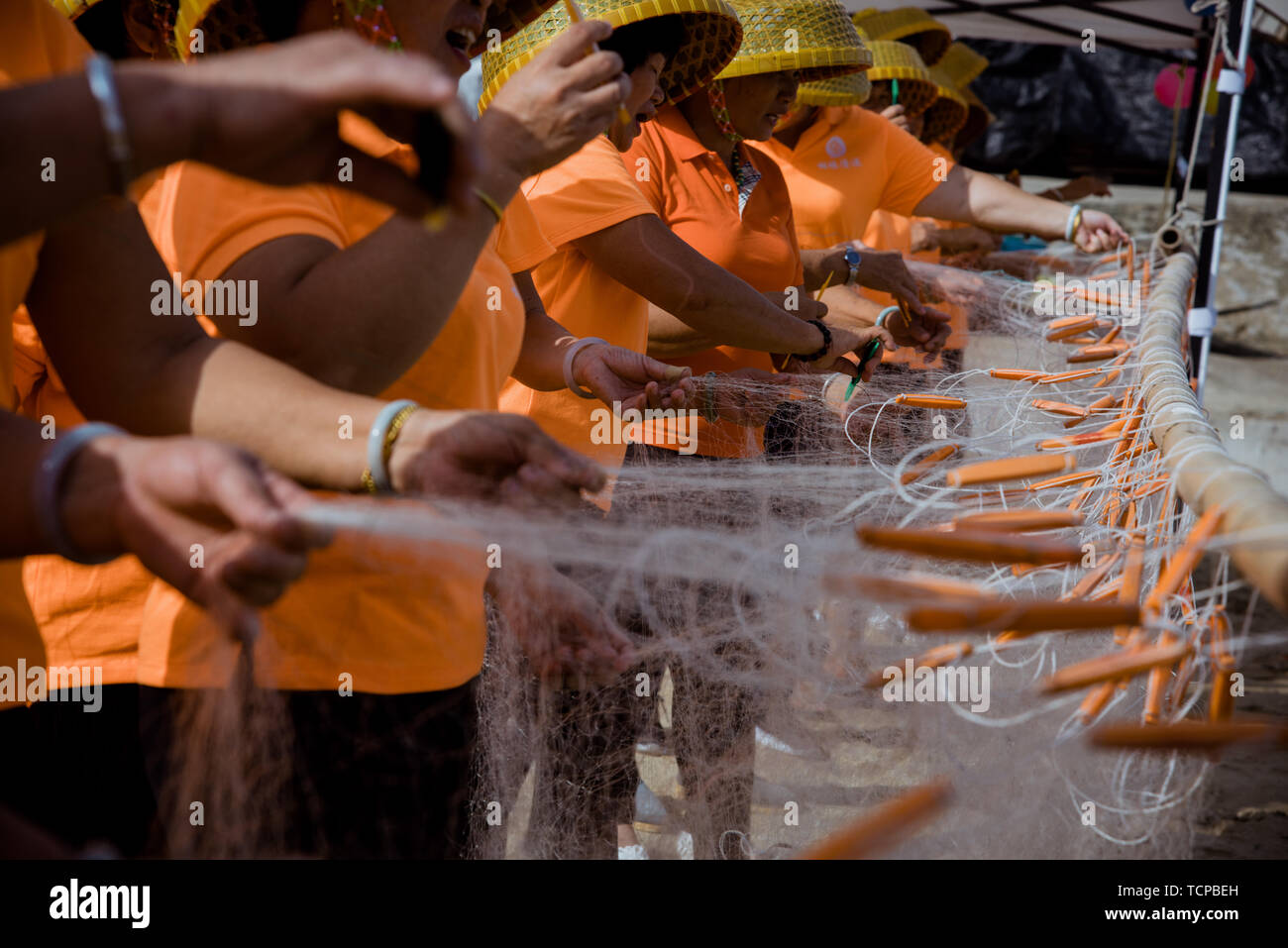 Fishermen weaving nets hi-res stock photography and images - Alamy