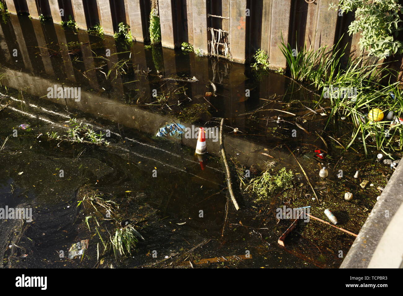 Contamination of rubbish on the canal in Doncaster town centre. Stock Photo