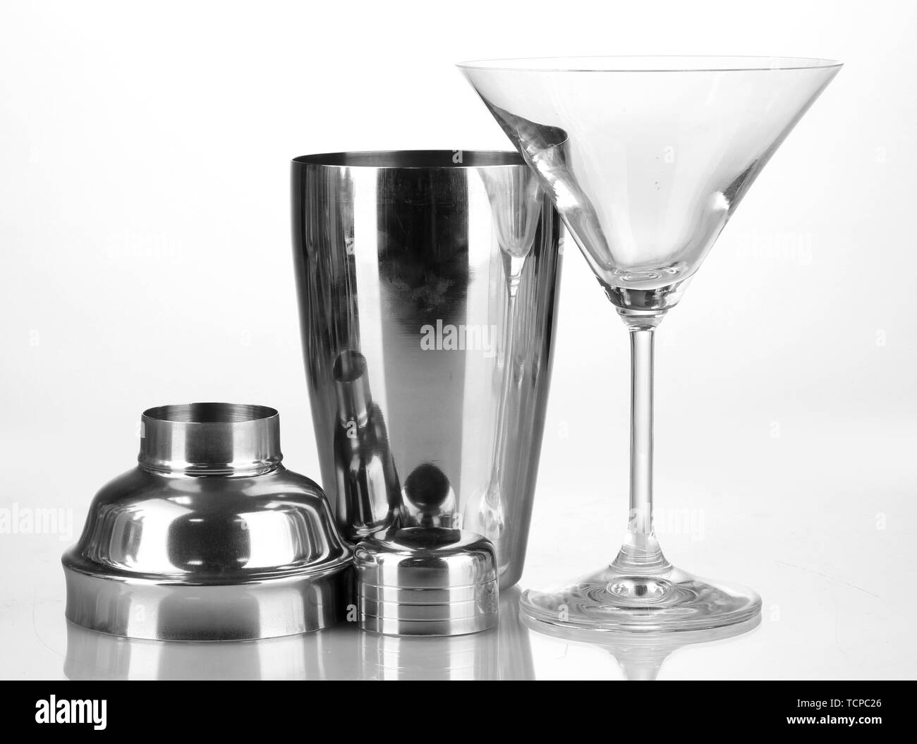 Cocktail shaker and cocktail glass isolated on white Stock Photo Alamy
