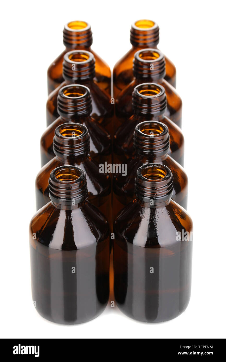 Medical bottles in the row isolated on white Stock Photo - Alamy