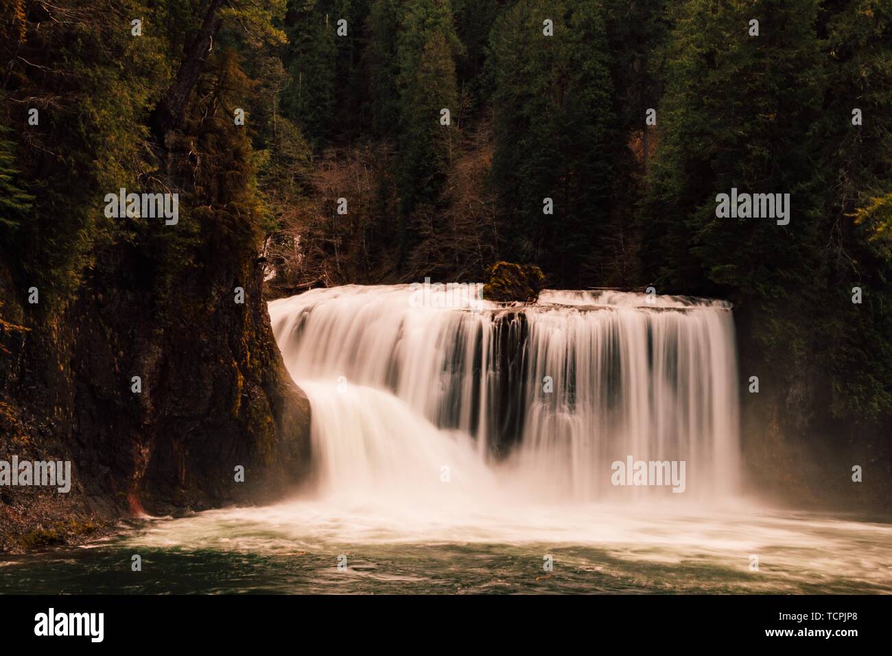 Beautiful waterfall in the forest Stock Photo - Alamy