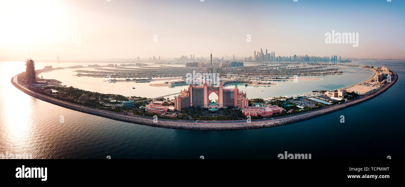 Dubai, United Arab Emirates - June 5, 2019: Atlantis hotel and the whole Palm island background in Dubai aerial view Stock Photo