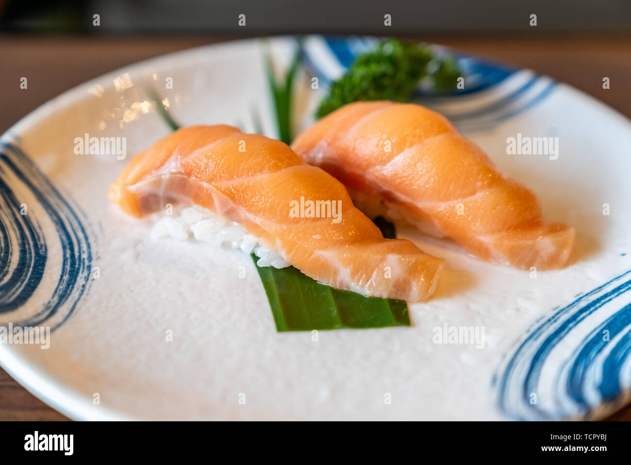 Salmon Sushi in Traditional Japanese style plate Stock Photo - Alamy