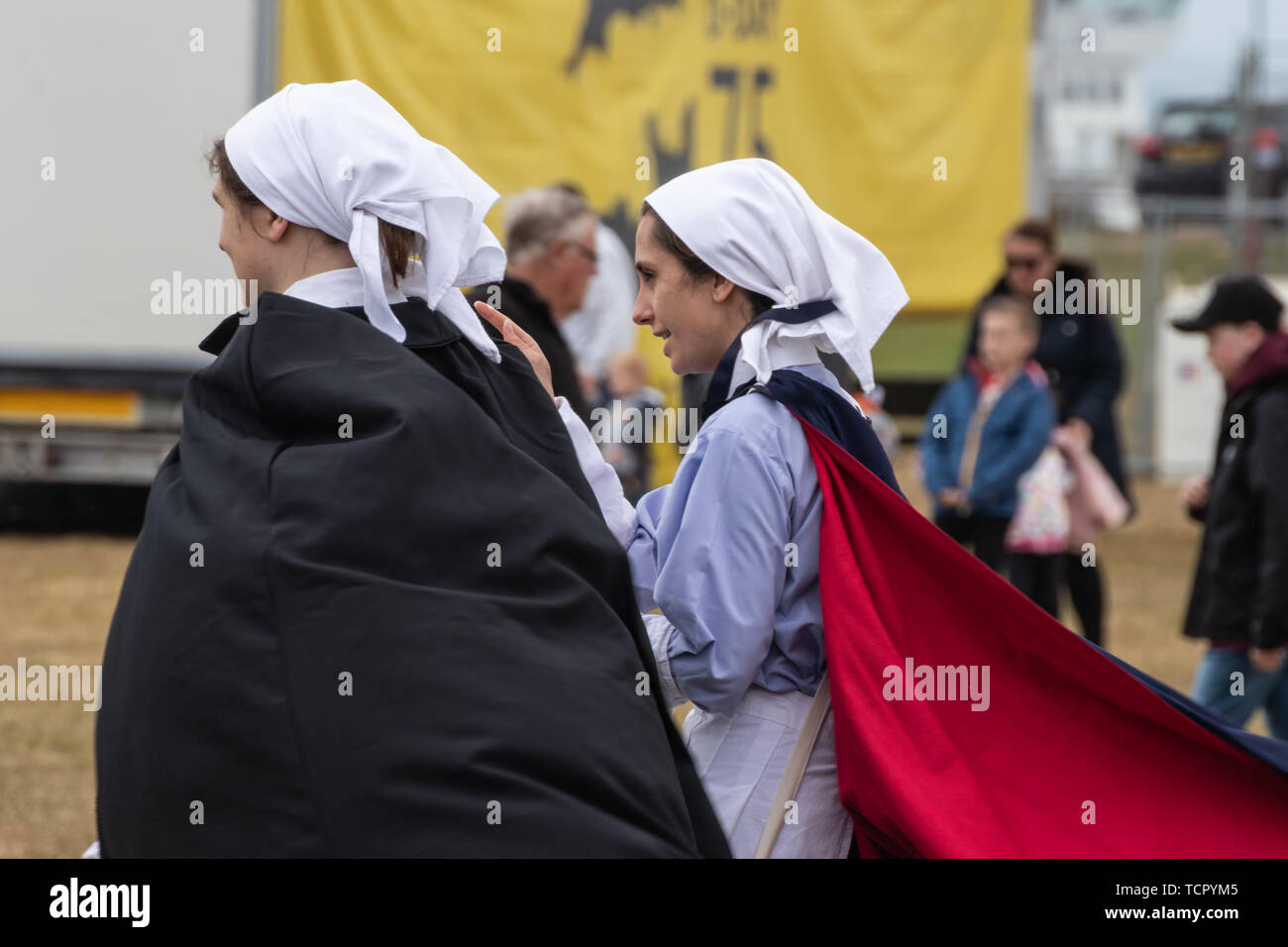 Two women dressed in authentic world war two nurses uniforms, People shots with period costumes Stock Photo